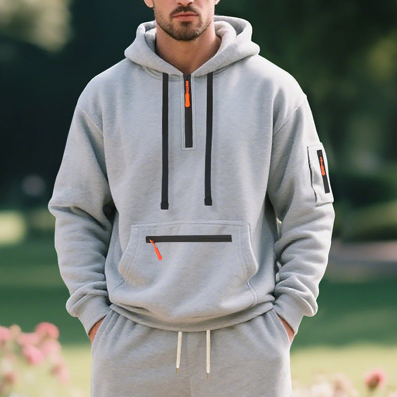 Men's half-zip hoodie with sealed zippers, kangaroo zip pocket, and arm pocket StylebySassy