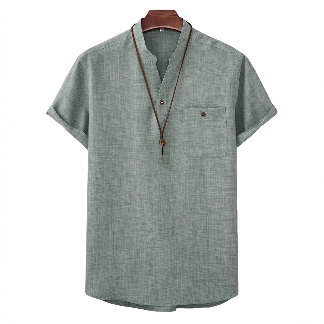 Men's casual Mandarin-style short-sleeve shirt with half-button placket, patch chest pocket, and rounded hem StylebySassy