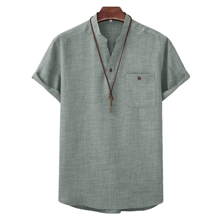 Men's casual Mandarin-style short-sleeve shirt with half-button placket, patch chest pocket, and rounded hem StylebySassy