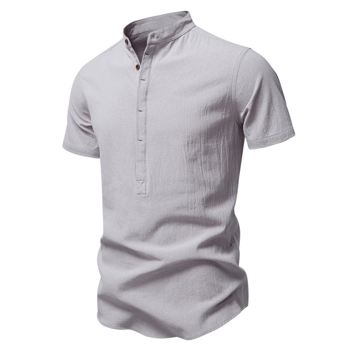 Men's casual short-sleeve shirt with stand-up collar, half button placket, and lightly textured cotton-linen quality StylebySassy