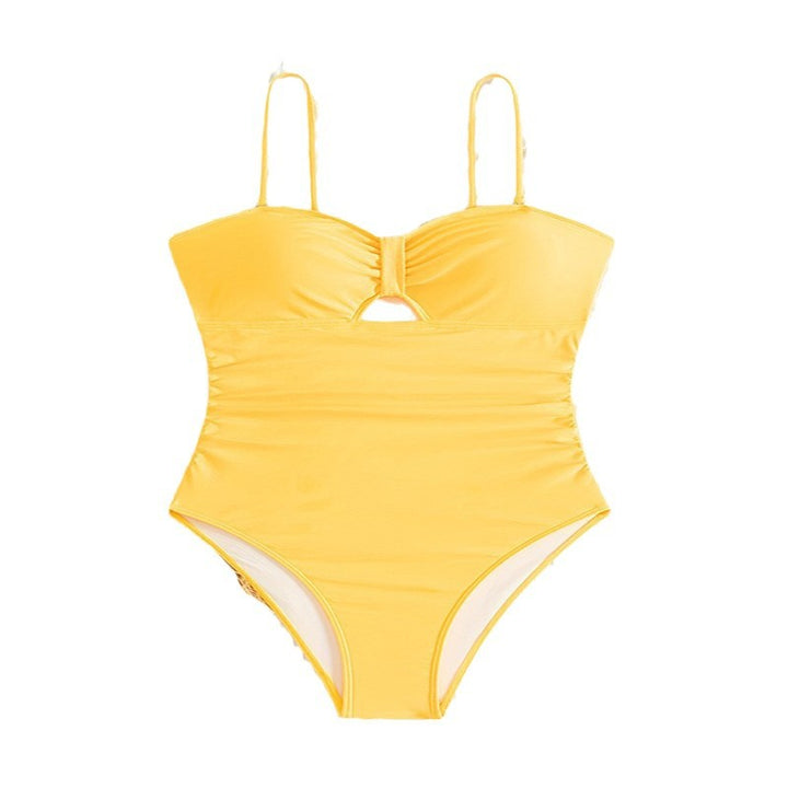 Women's one-piece swimsuit with sophisticated cut-out and gathering.