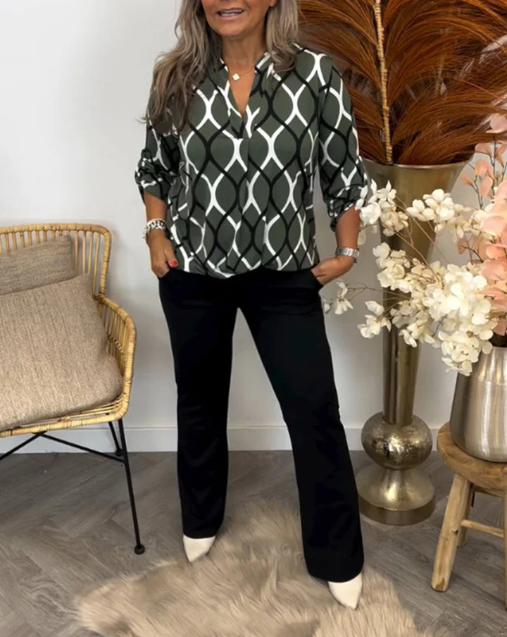 Ladies casual long tunic with V-neck three-quarter sleeves side pockets and geometric chain print StylebySassy