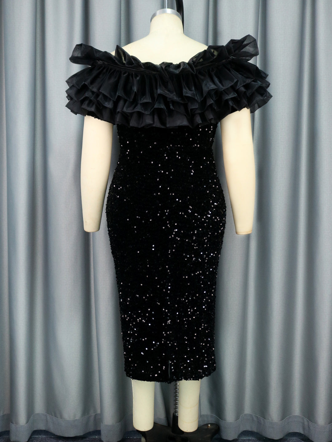 Women glamorous evening dress with voluminous ruffles and sequins StylebySassy