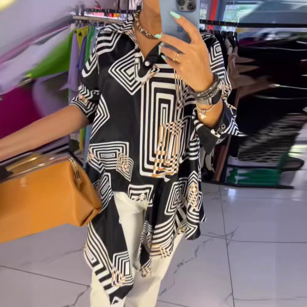Women’s loose silk-look blouse with graphic square print, asymmetrical hem and mother-of-pearl button placket StylebySassy