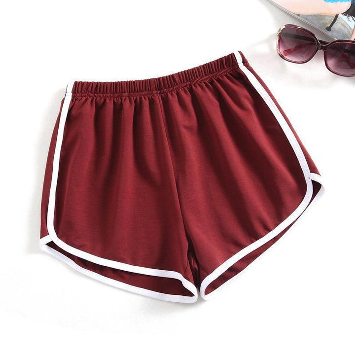 Women's sporty shorts with elastic waistband and contrasting stripes StylebySassy