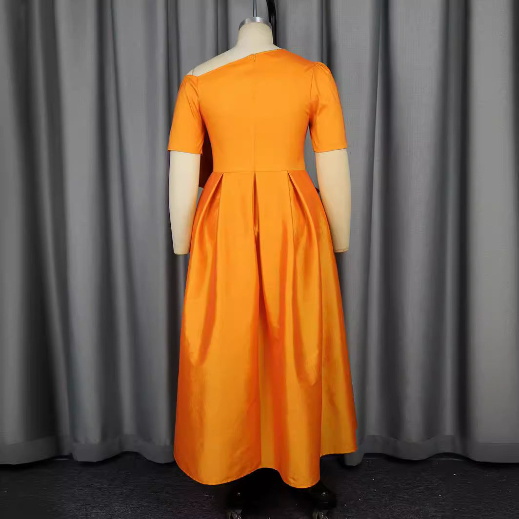 Women's festive evening dress with asymmetric neckline and voluminous draping element StylebySassy