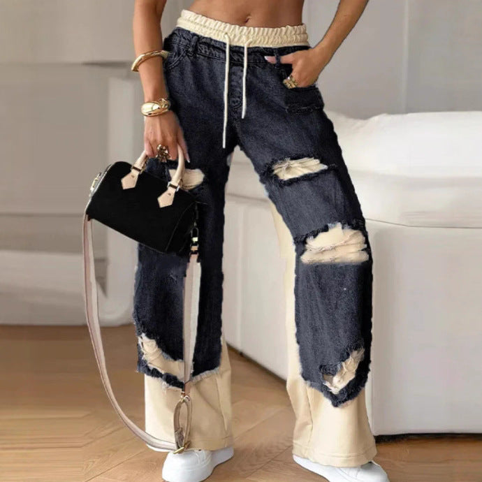 Women's loose patchwork jeans with elastic drawstring waistband, destroyed look and contrasting sweat inserts StylebySassy