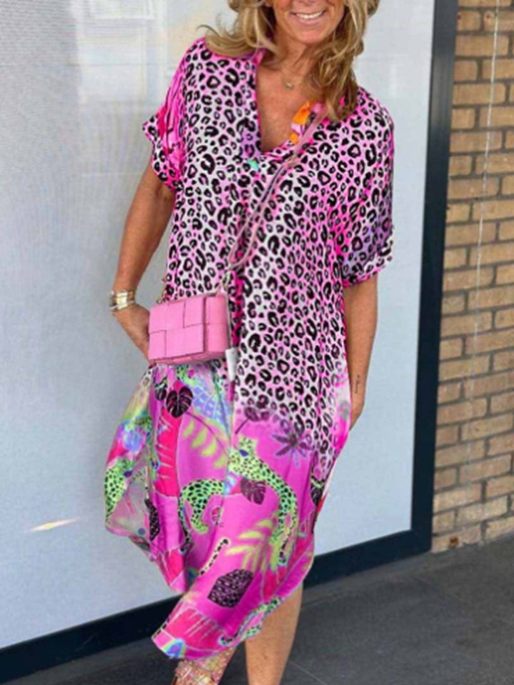 Women's loosely fitted V-neck midi dress with leopard and tropical print StylebySassy