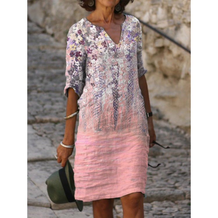 Women's knee-length midi dress in a material mix with floral lace surface, V-neck and crinkle texture StylebySassy