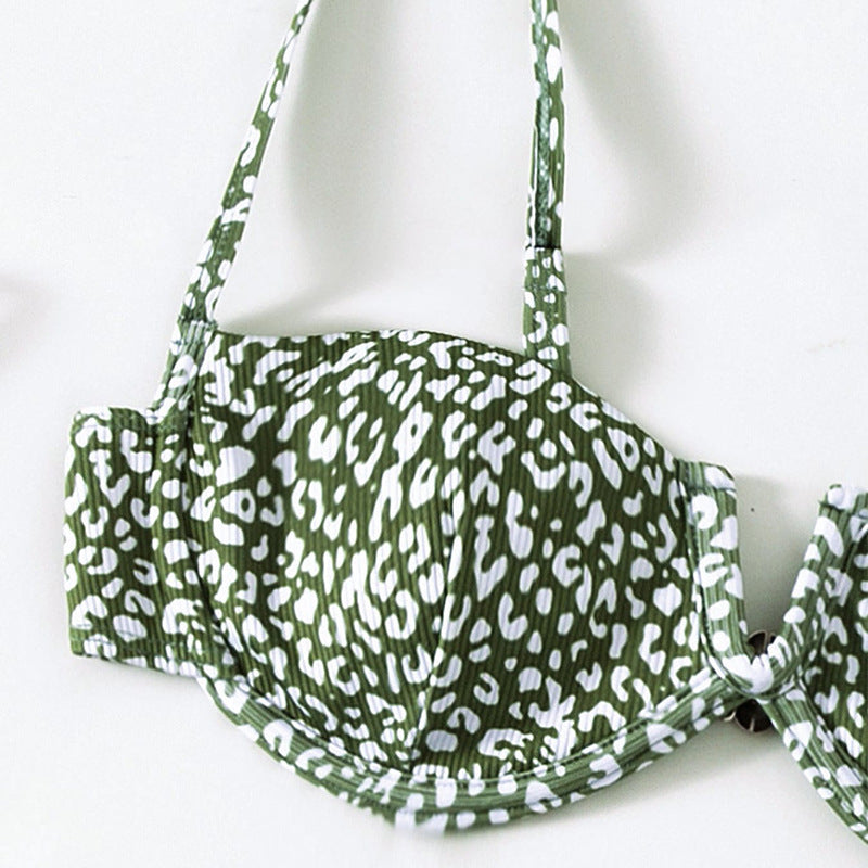 Women's bikini set with a modern animal pattern and elegant wrap skirt StylebySassy
