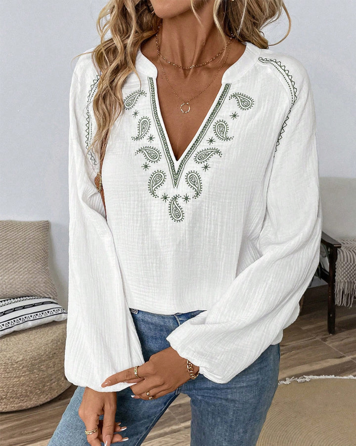 Women's embroidered cotton gauze tunic blouse with ornamental V-neck embroidery and trumpet sleeves StylebySassy