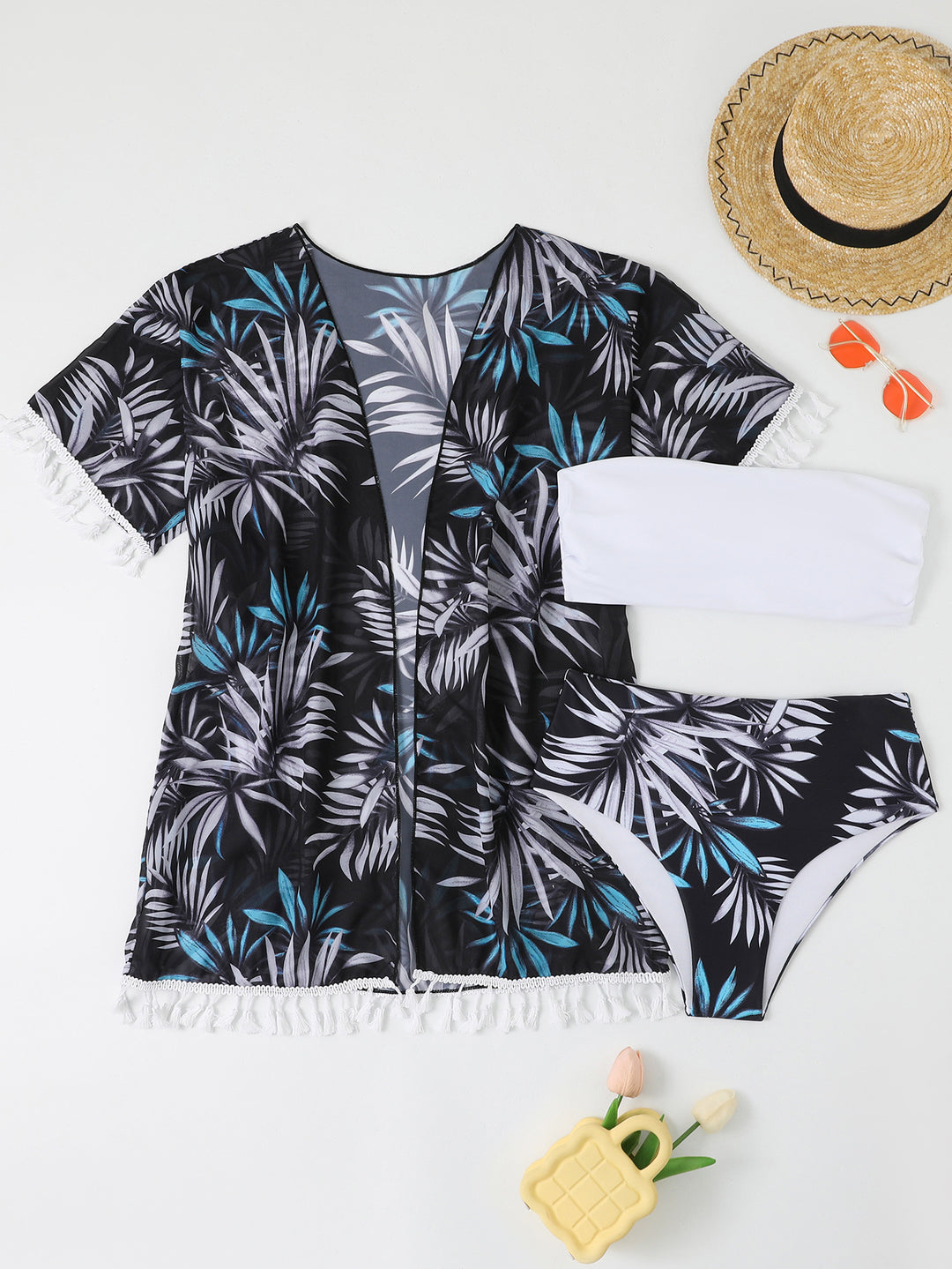 Ladies elegant beach outfit with floral cover-up and matching bikini StylebySassy