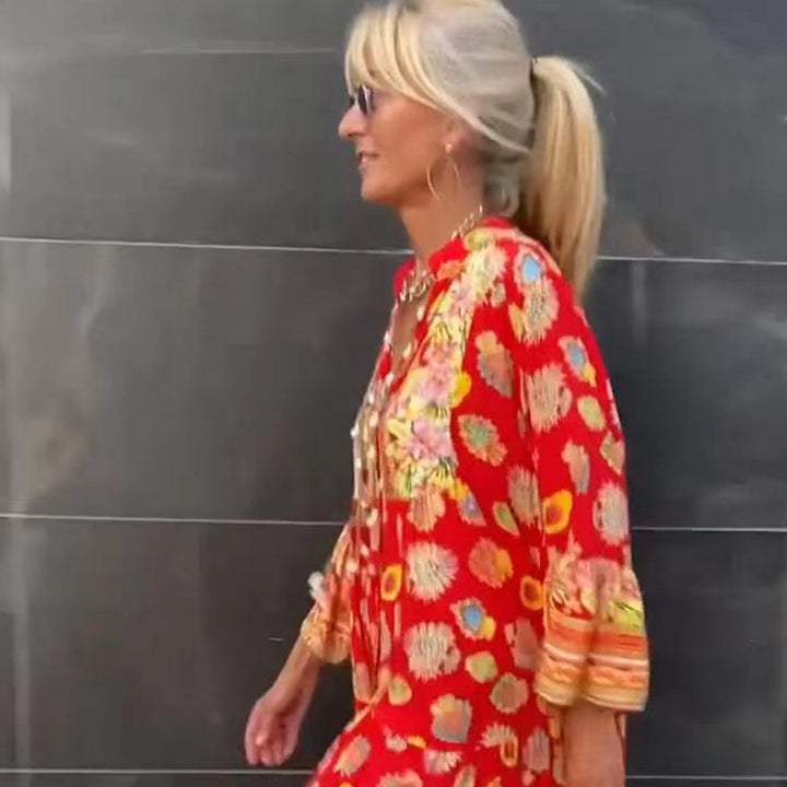 Women's airy kaftan midi dress with folk-inspired border print, V-neckline, tassel ties, and flounce bell sleeves StylebySassy