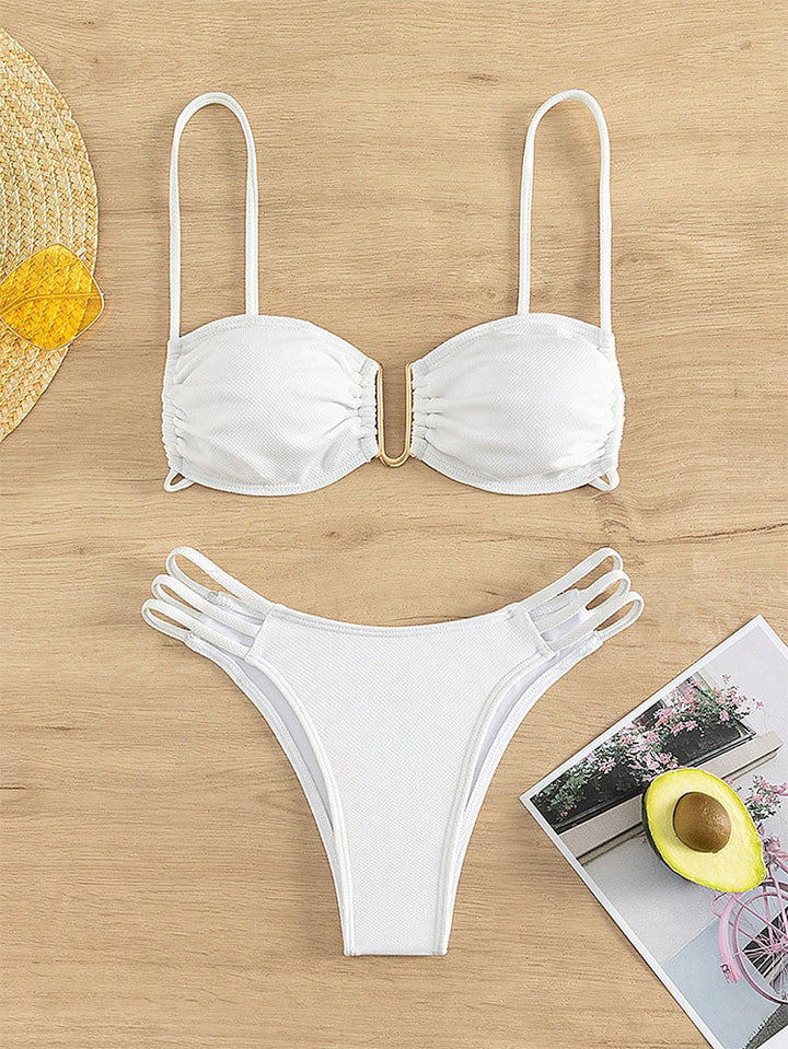 Women's bikini set with modern ruffle details and elegant golden accent StylebySassy