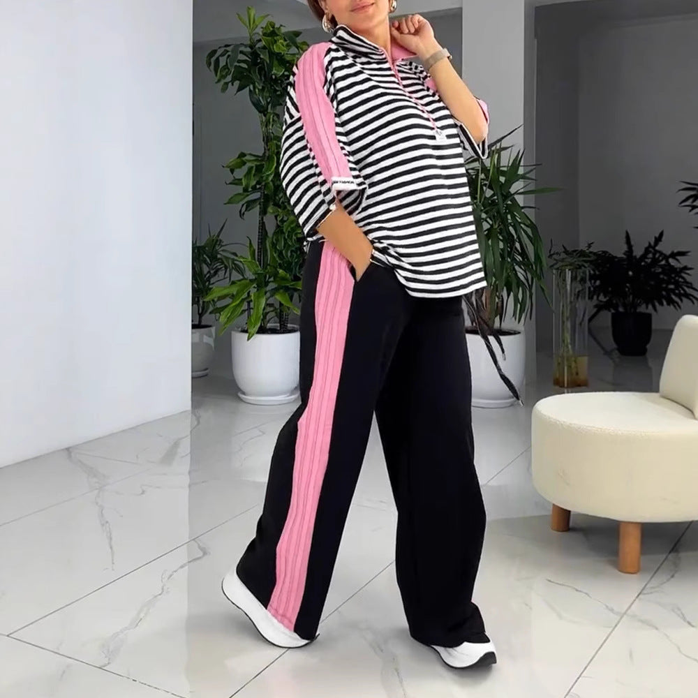 Women's casual two-piece polo lounge set with oversized stripes, pompom application, and contrasting side panels StylebySassy