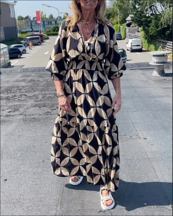 Women's maxi dress with geometric all-over print, smocked waist and ruffled tiers StylebySassy