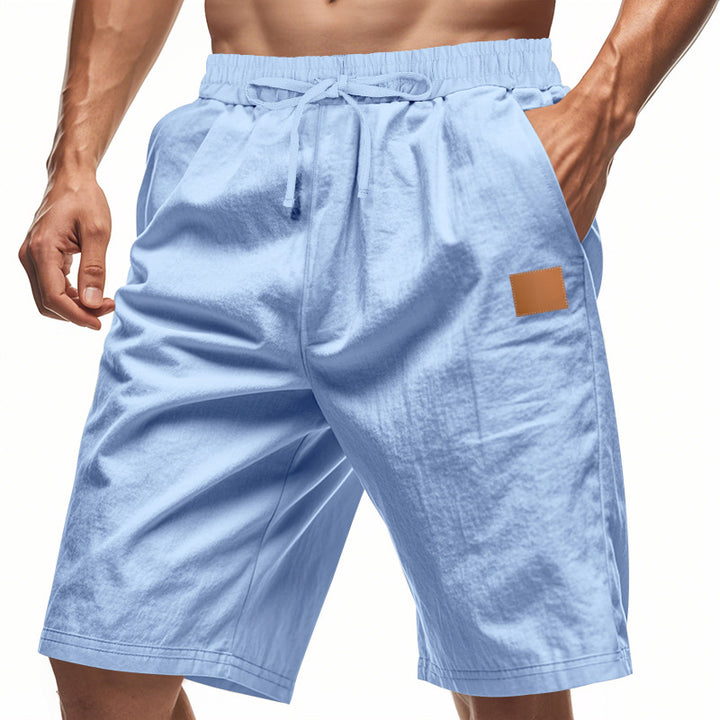Men's lightweight casual Bermuda shorts with elastic waistband, drawstring and discreet leather application StylebySassy