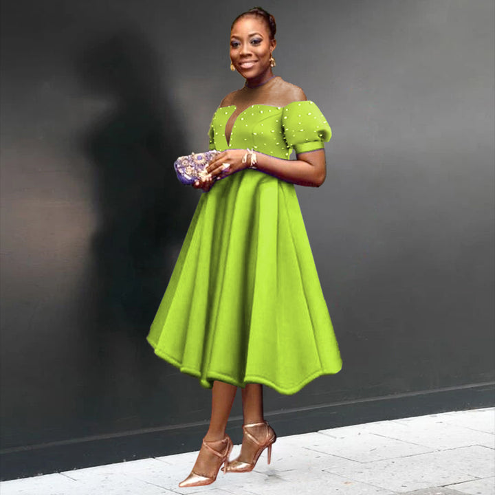 Women's festive midi dress with ruffled sleeves and shimmering accents StylebySassy