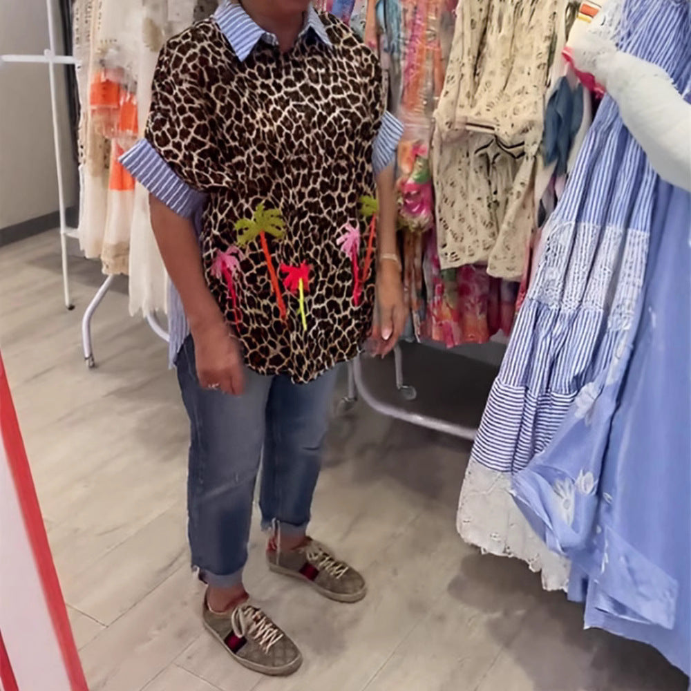 Women wide-cut poncho tunic with leopard print and decorative flamingo appliqués StylebySassy