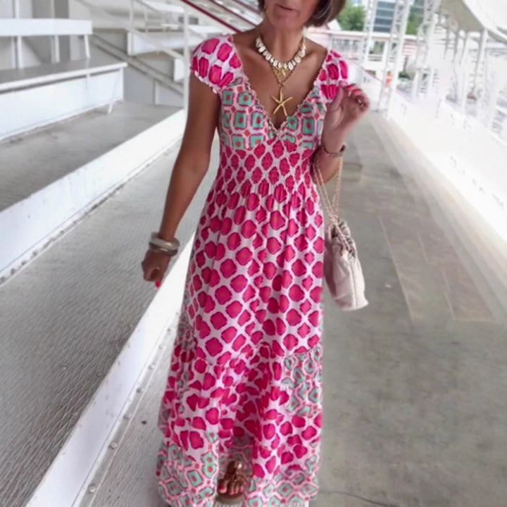 Women’s summer tiered dress with smocked top, V-neckline and puff sleeves StylebySassy