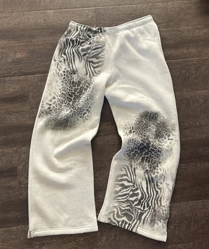 Women nan loose sweatpants with asymmetrical animal print, elastic comfort waistband and straight leg StylebySassy