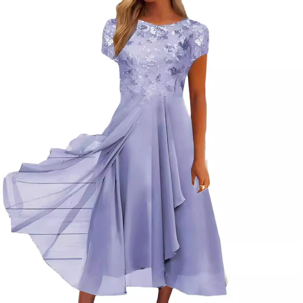 Women's flowing chiffon mid dress with floral embroidered top and asymmetrical tiered skirt StylebySassy