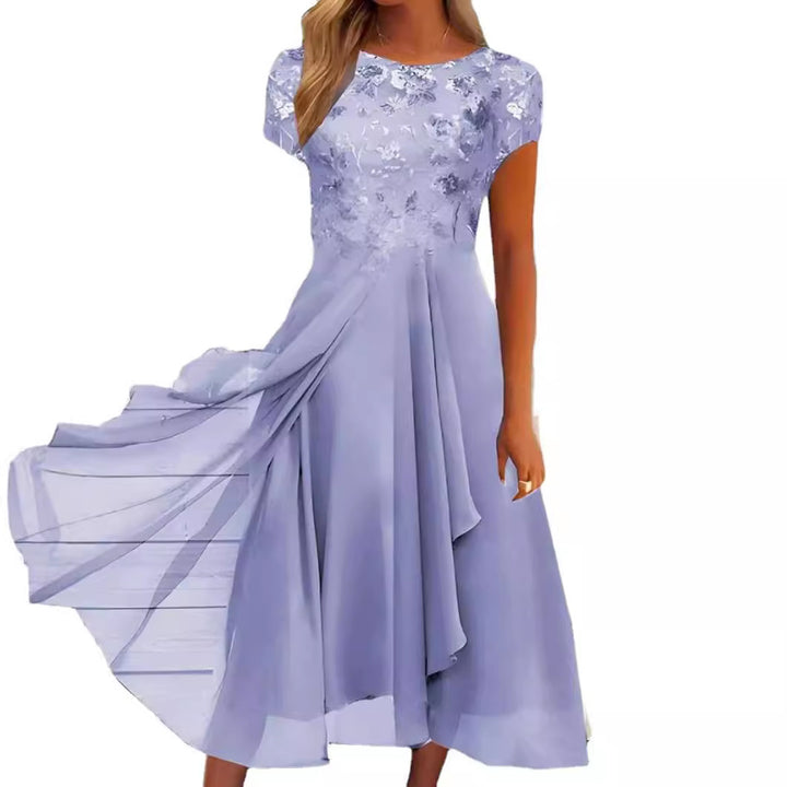 Women's flowing chiffon mid dress with floral embroidered top and asymmetrical tiered skirt StylebySassy