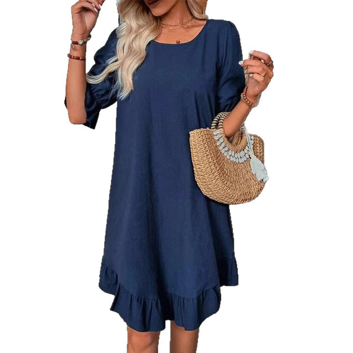 Women's lightweight A-line dress with ruffle hem and three-quarter sleeves made of linen blend StylebySassy