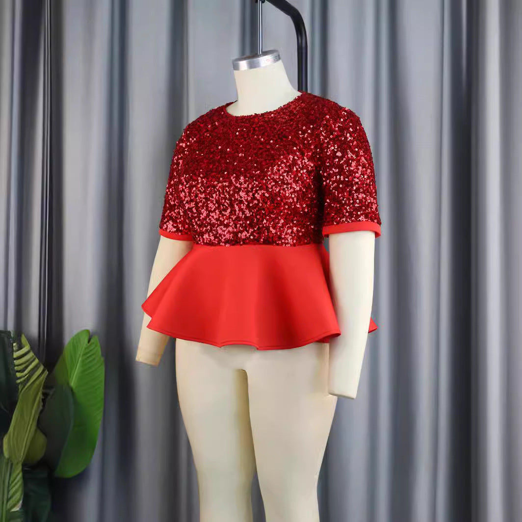Ladies elegant glitter top with swinging peplum