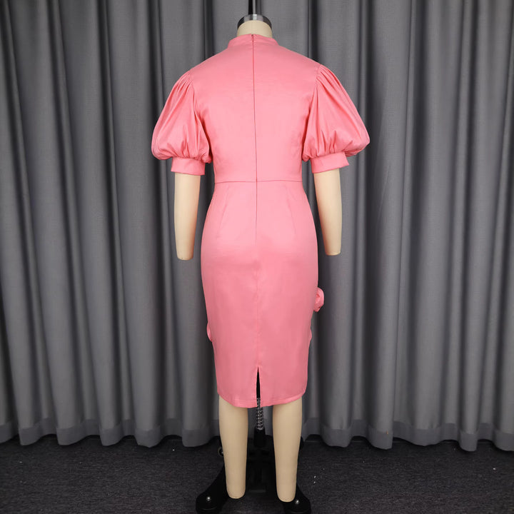Ladies elegant cocktail dress with puff sleeves and floral details StylebySassy