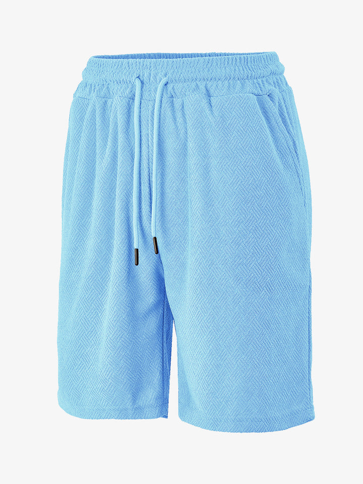 Men's terry shorts with herringbone texture, elastic drawstring waistband, and side pockets StylebySassy