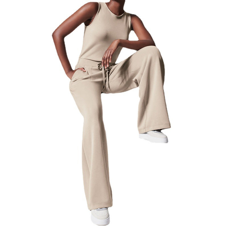 Women's sleeveless knitted jumpsuit with wide palazzo legs, drawstring waistband, and patch pockets StylebySassy