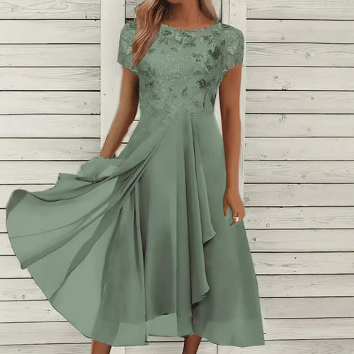 Women's flowing chiffon mid dress with floral embroidered top and asymmetrical tiered skirt StylebySassy