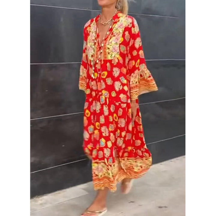 Women's airy kaftan midi dress with folk-inspired border print, V-neckline, tassel ties, and flounce bell sleeves StylebySassy