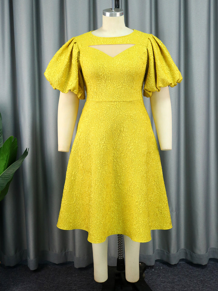 Women's midi dress with voluminous puff sleeves and decorative neckline StylebySassy