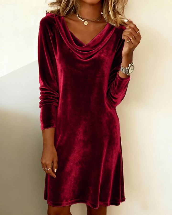 Women's velvet dress with draped waterfall neckline, knee-length A-line silhouette and long sleeves StylebySassy