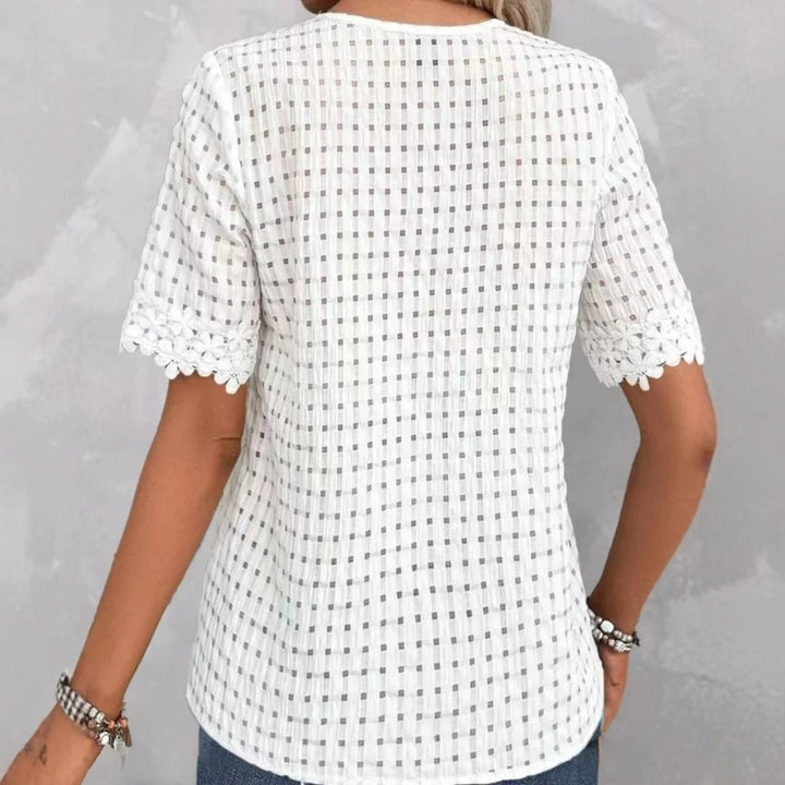 Women's lightweight structured shirt with check mesh, decorative lace trim at the V-neck and short sleeve hems StylebySassy