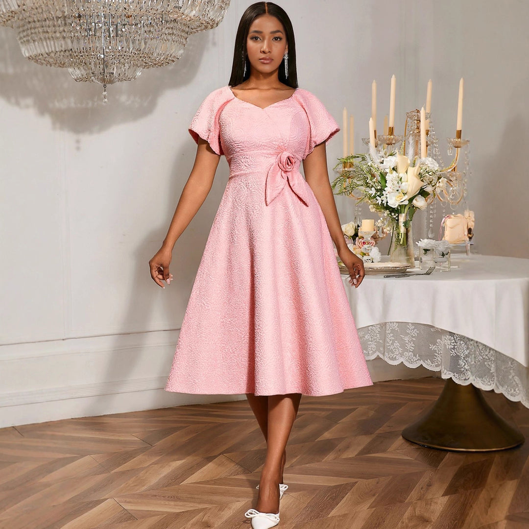 Ladies elegant dress with peplum, floral applique and puff sleeves StylebySassy