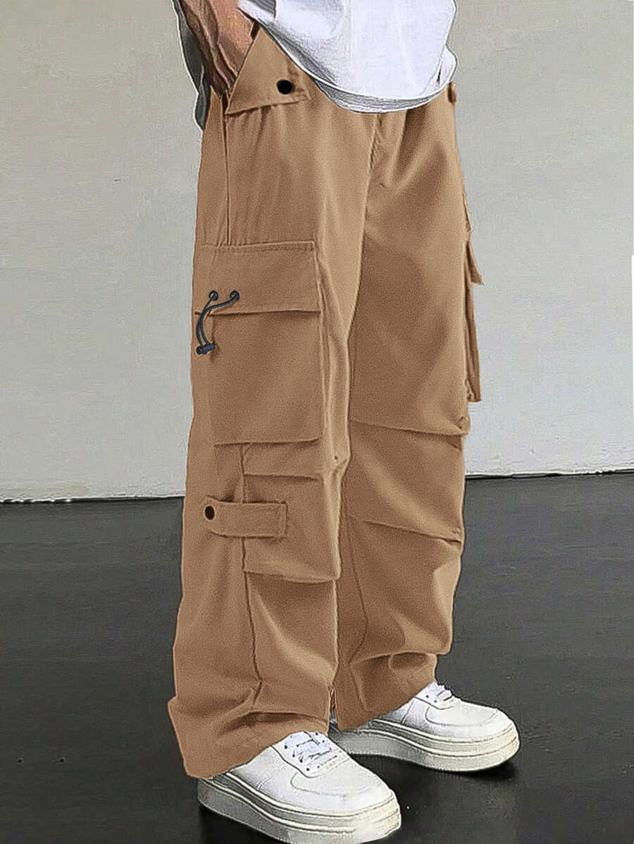 Men's baggy cargo pants with utilitarian flap pockets, drawstring waistband, and reinforced seams StylebySassy