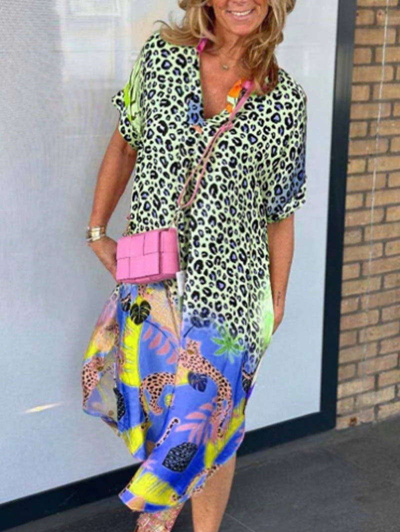 Women's loosely fitted V-neck midi dress with leopard and tropical print StylebySassy