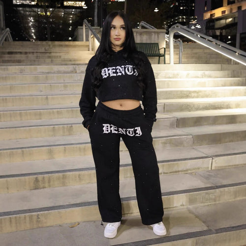 Women's wide sweatpants with all-over stars, Gothic logo print, elastic waistband, and side pockets StylebySassy