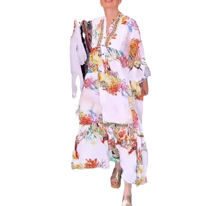 Women's airy maxi dress in layered look with V-neck, button placket, and three-quarter bell sleeves StylebySassy