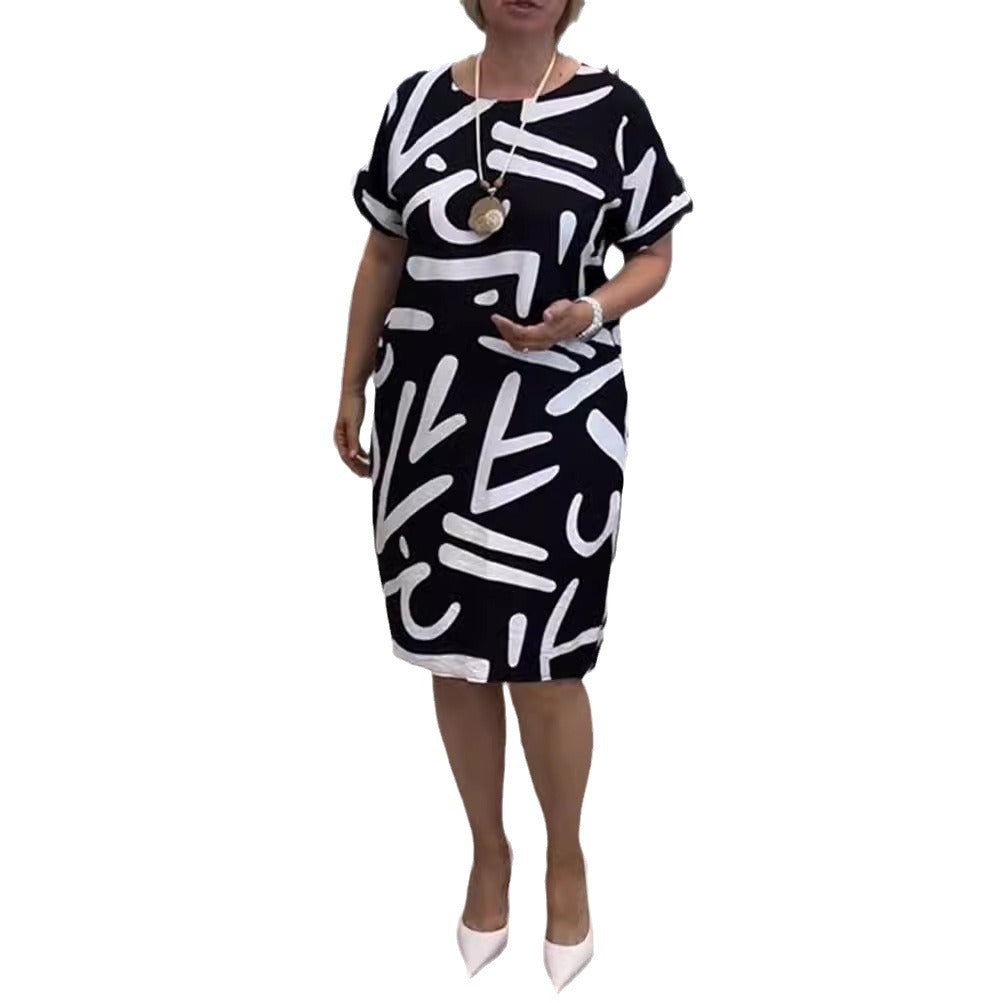 Women knee-length comfort shift dress with large brush stroke print and rolled short sleeves StylebySassy