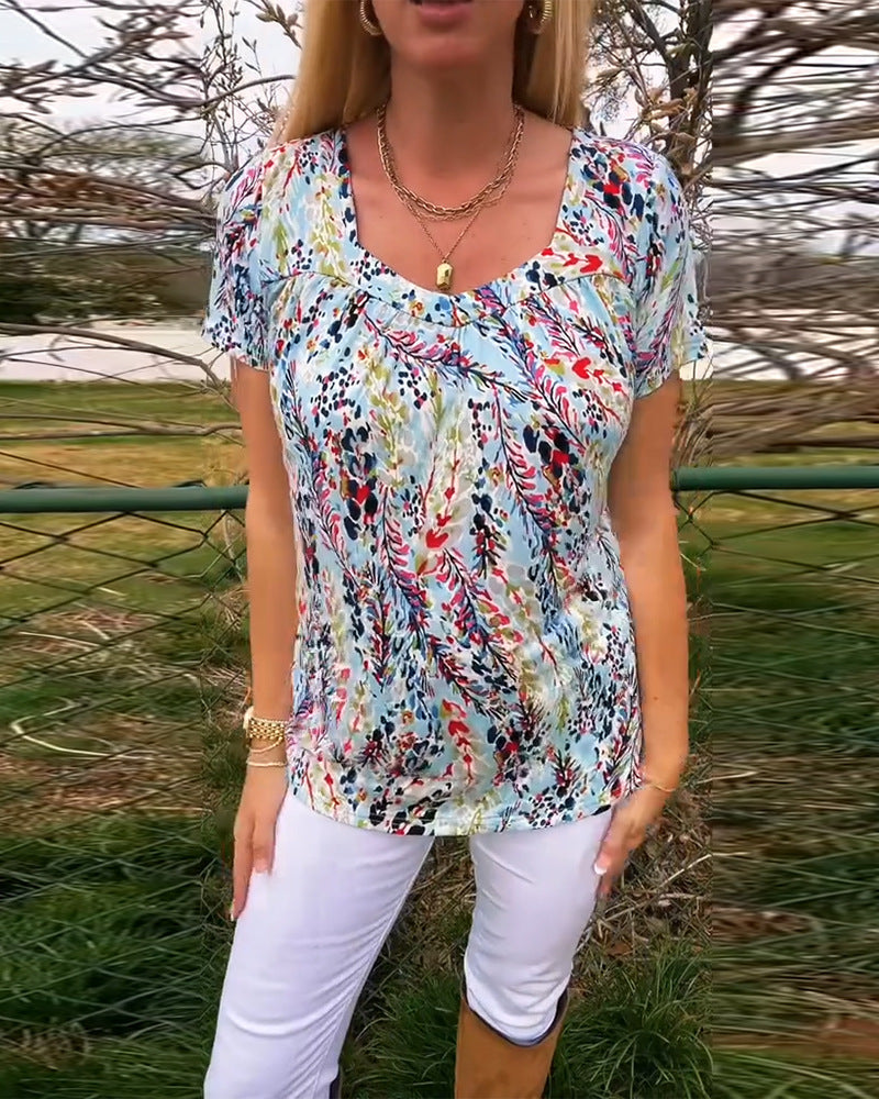 Women's lightweight floral round neck printed shirt with bust pleats and casual hip length StylebySassy