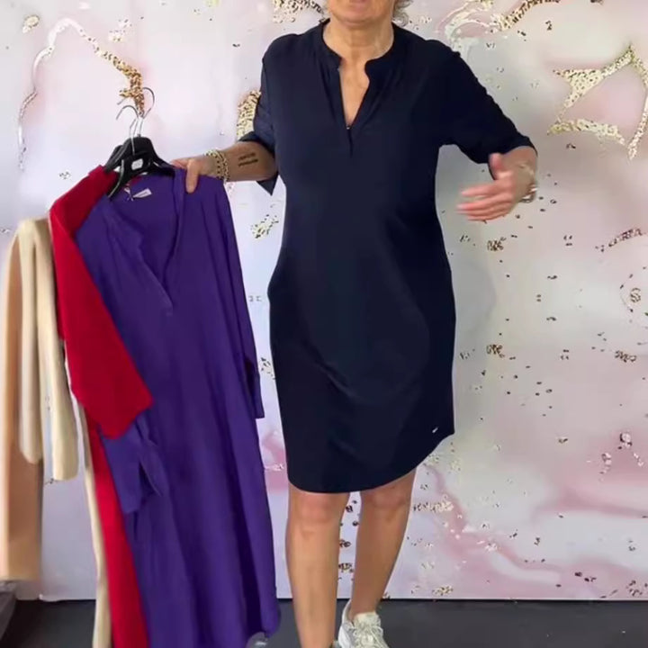 Women's knee-length casual jersey dress with stand-up collar and V-neck StylebySassy