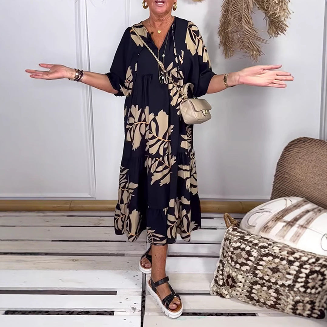 Women’s casual tiered midi dress with V-neck and large floral print StylebySassy