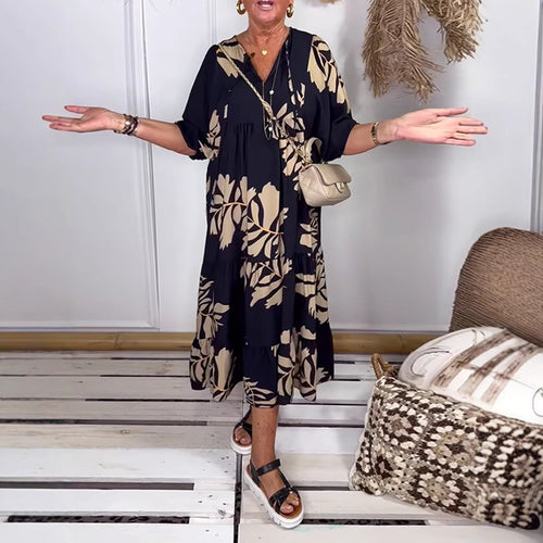 Women’s casual tiered midi dress with V-neck and large floral print StylebySassy
