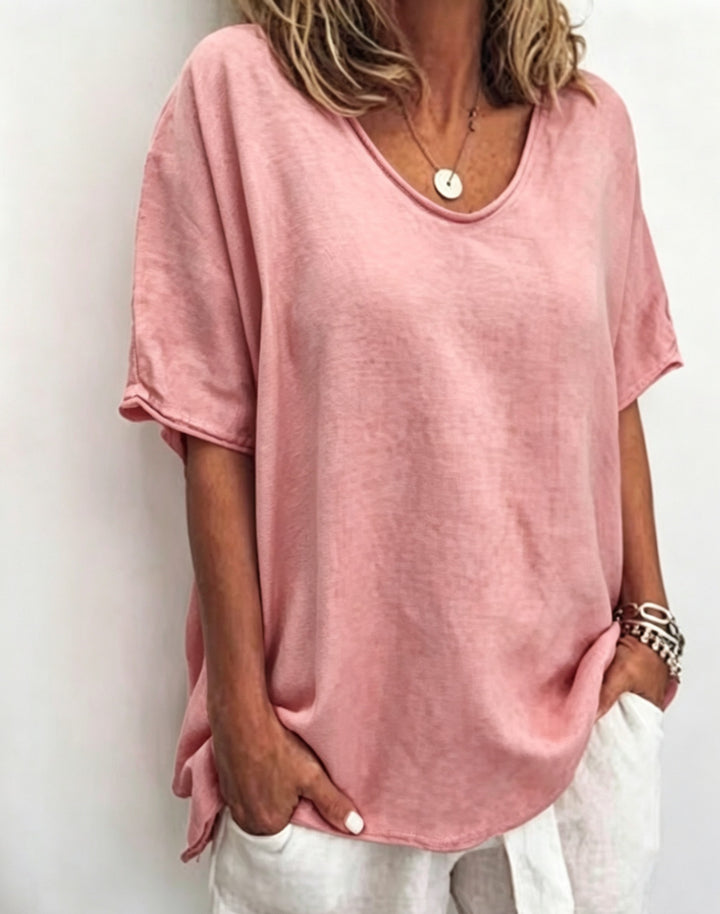 Women's loosely cut linen blend relaxed shirt with round neck, dropped sleeves and side slits StylebySassy