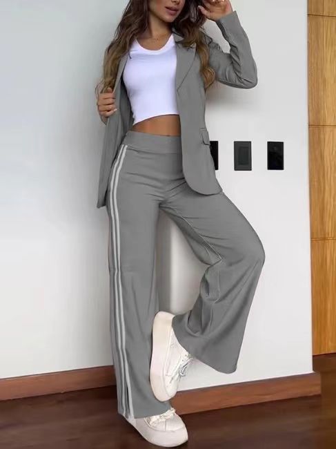 Ladies nan sporty-elegant two-piece blazer set with fitted blazer and wide jogging pants cut with side stripes StylebySassy