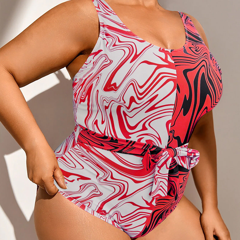 Women's one-piece swimsuit with modern marble pattern and waist-cinching belt StylebySassy
